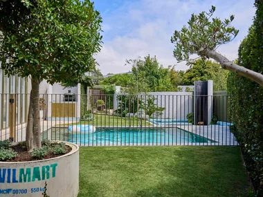 Family-oriented backyard design with a Tuscan twist