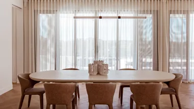 Luxaflex curtains showing in king home's dining space