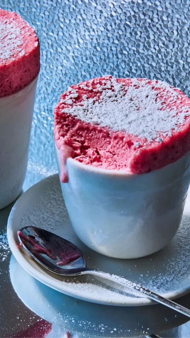 Pink strawberry souffle dusted with icing sugar to make for Valentine's Day