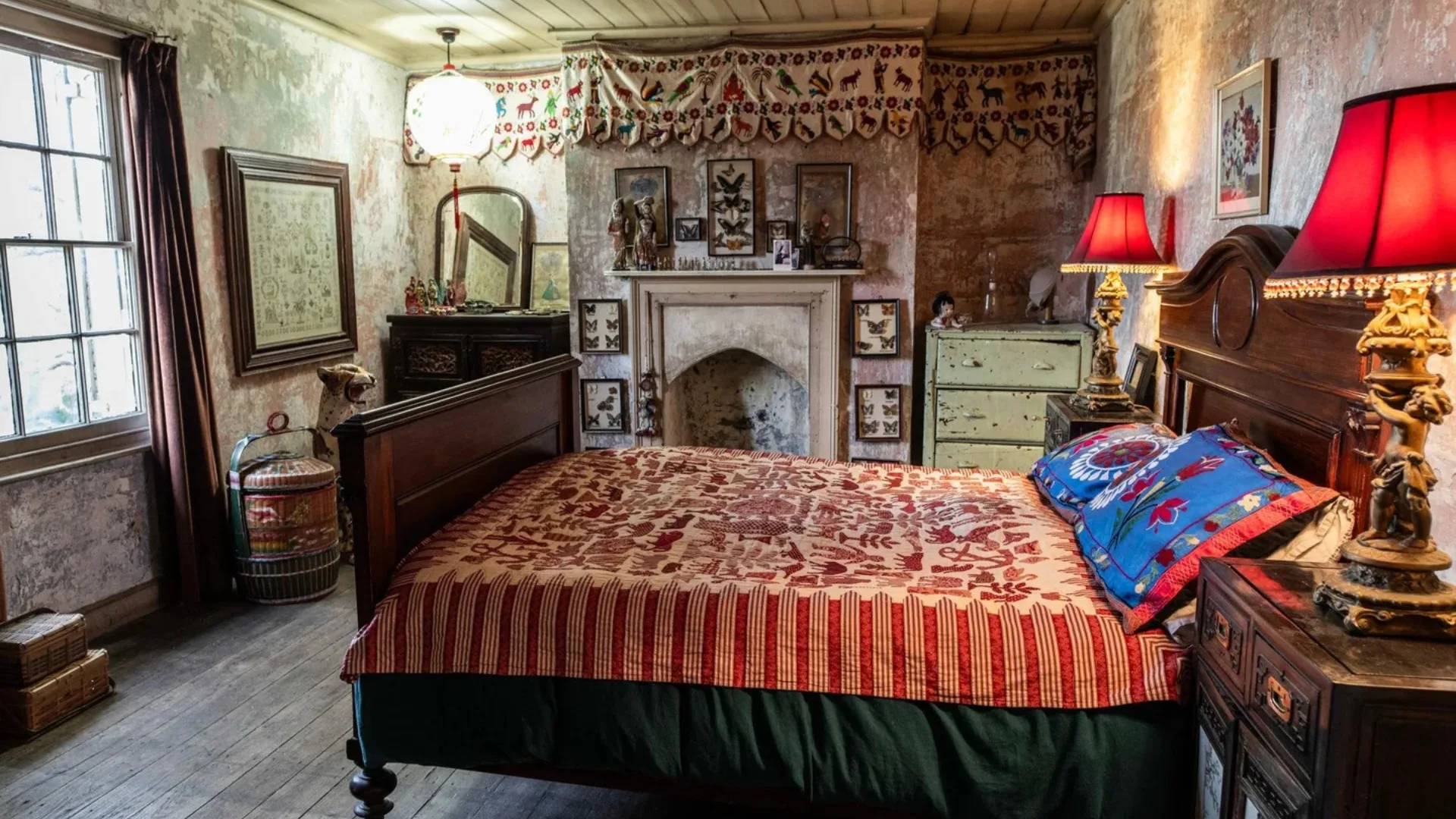 Cozy bedroom inside a Georgian house with patterned quilt, antique furniture, and red lamps on wooden nightstands.