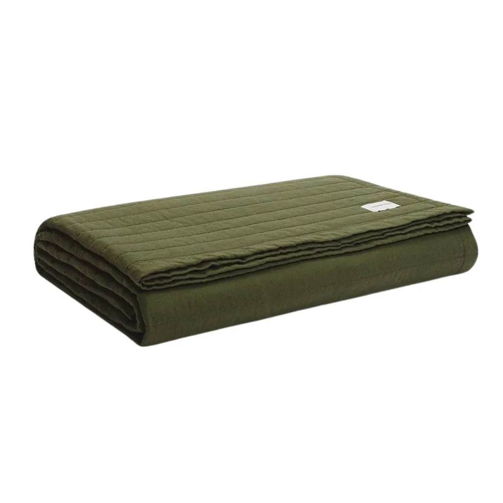 a folded olive green quilt cover throw from country road