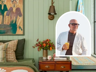 Neale Whitaker next to picture of bedroom