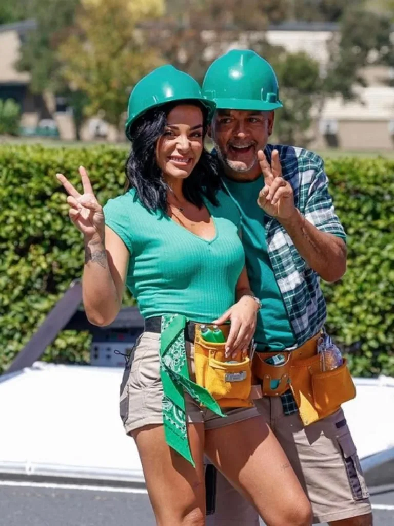 The Block 2026 team Tayla and Rick in green shirts and hard hats
