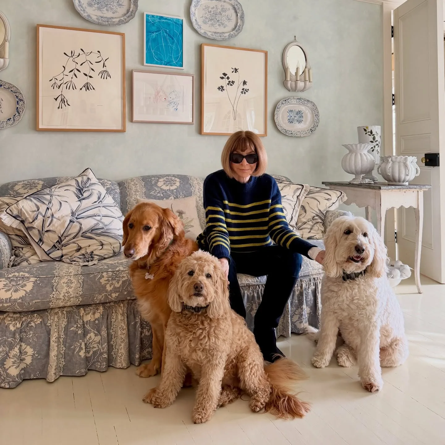 Anna Wintour with her dogs at her home