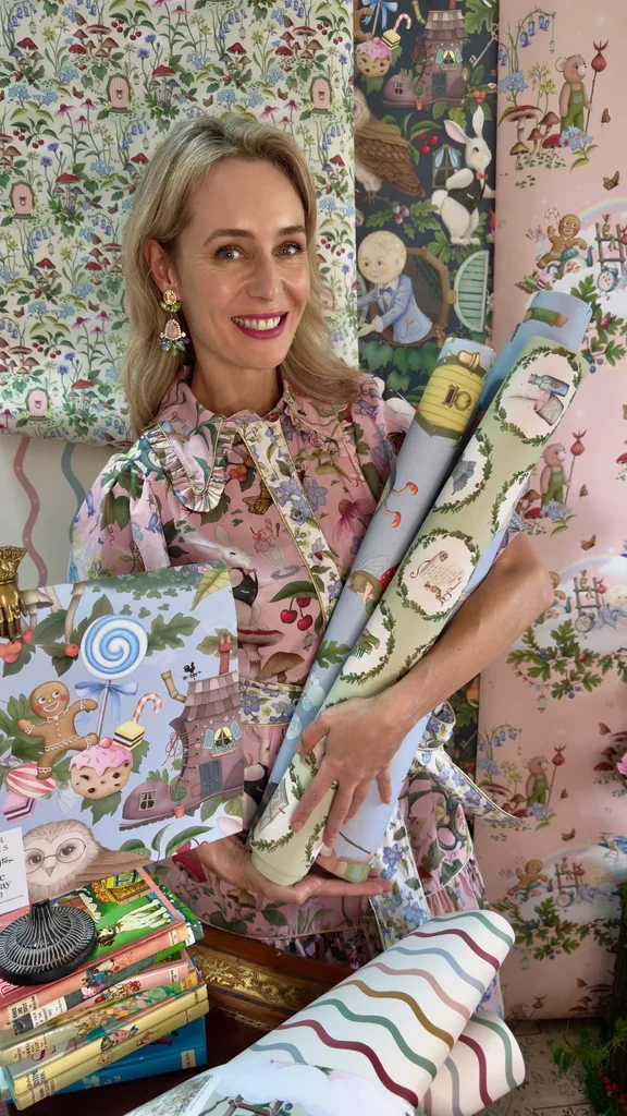 Fleur Harris with her Faraway Tree wallpaper