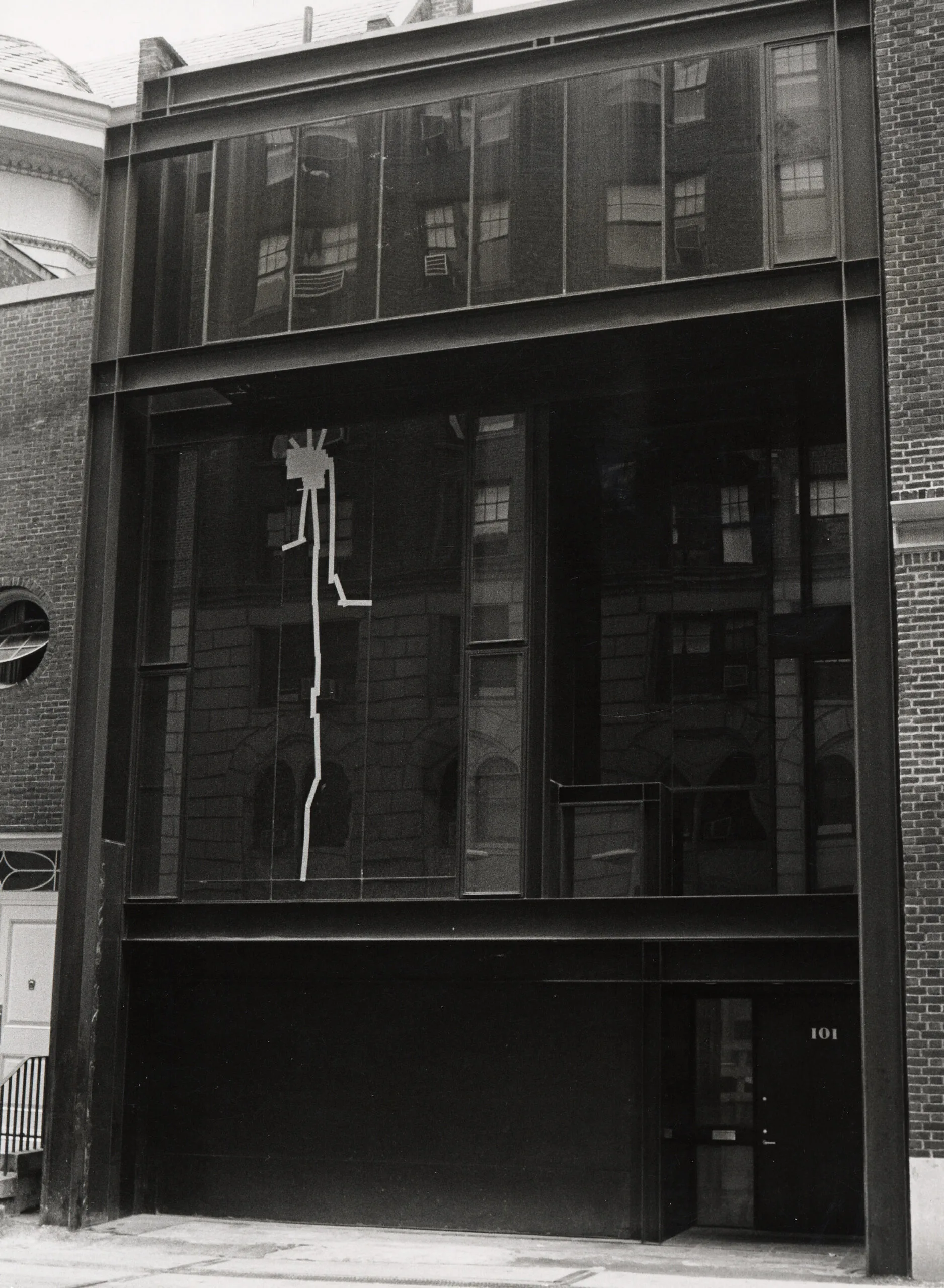 Black and white image of Halston House exterior in 1980
