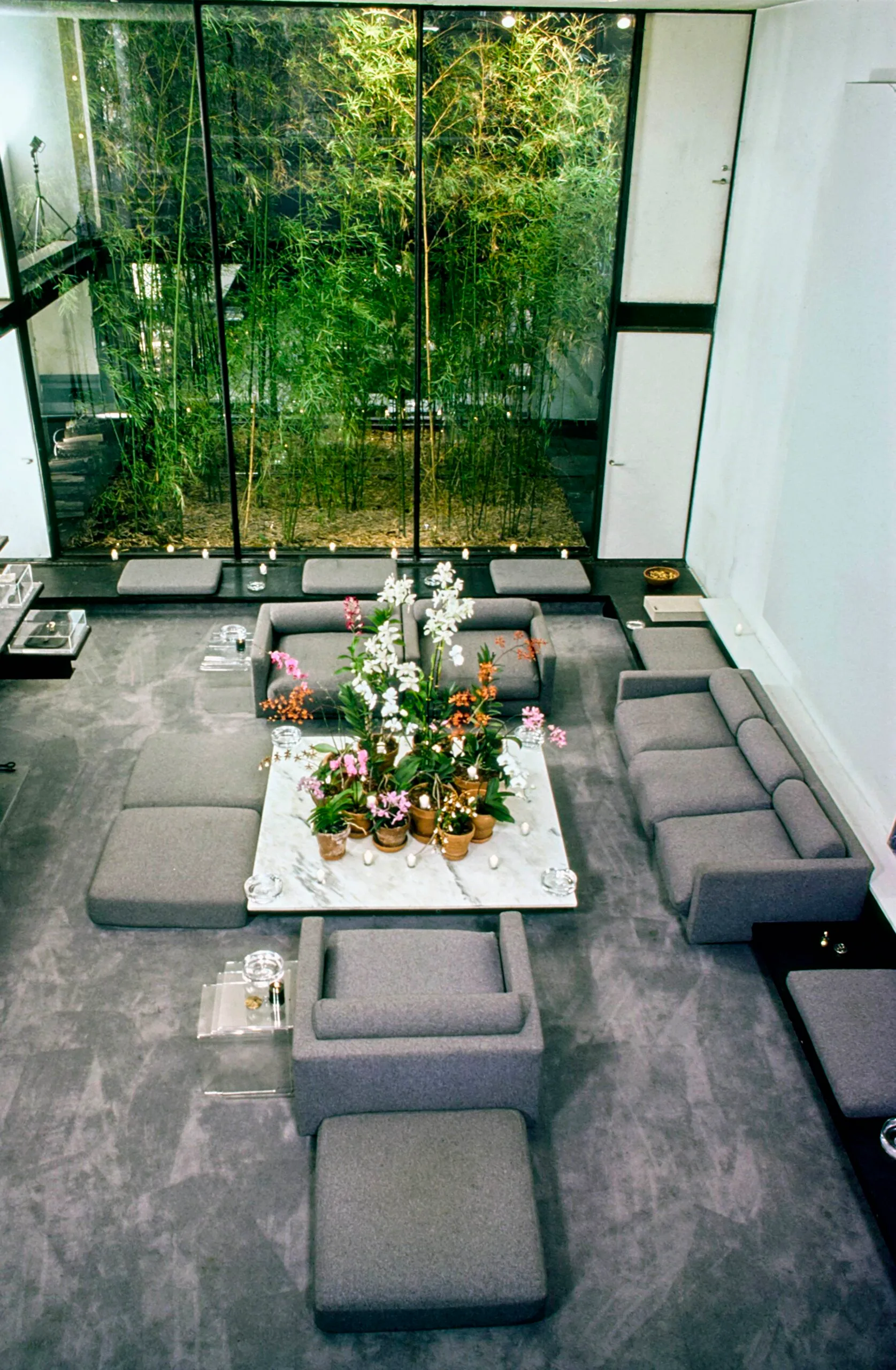 Overhead view of the living room, decorated in tones of grey, in Halston's New York townhouse