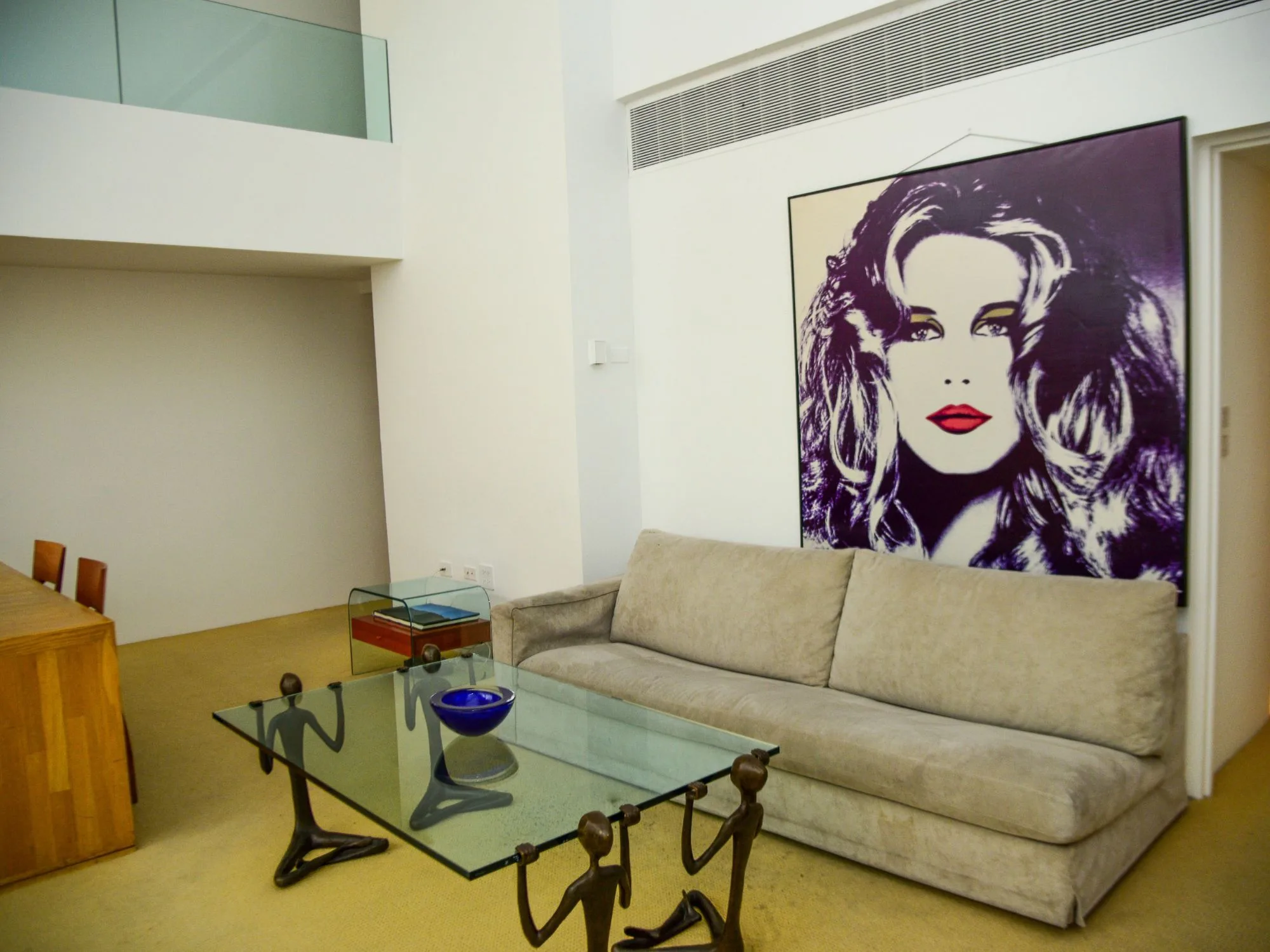 A pop art portrait of Claudia Schiffer in Halston's former living area