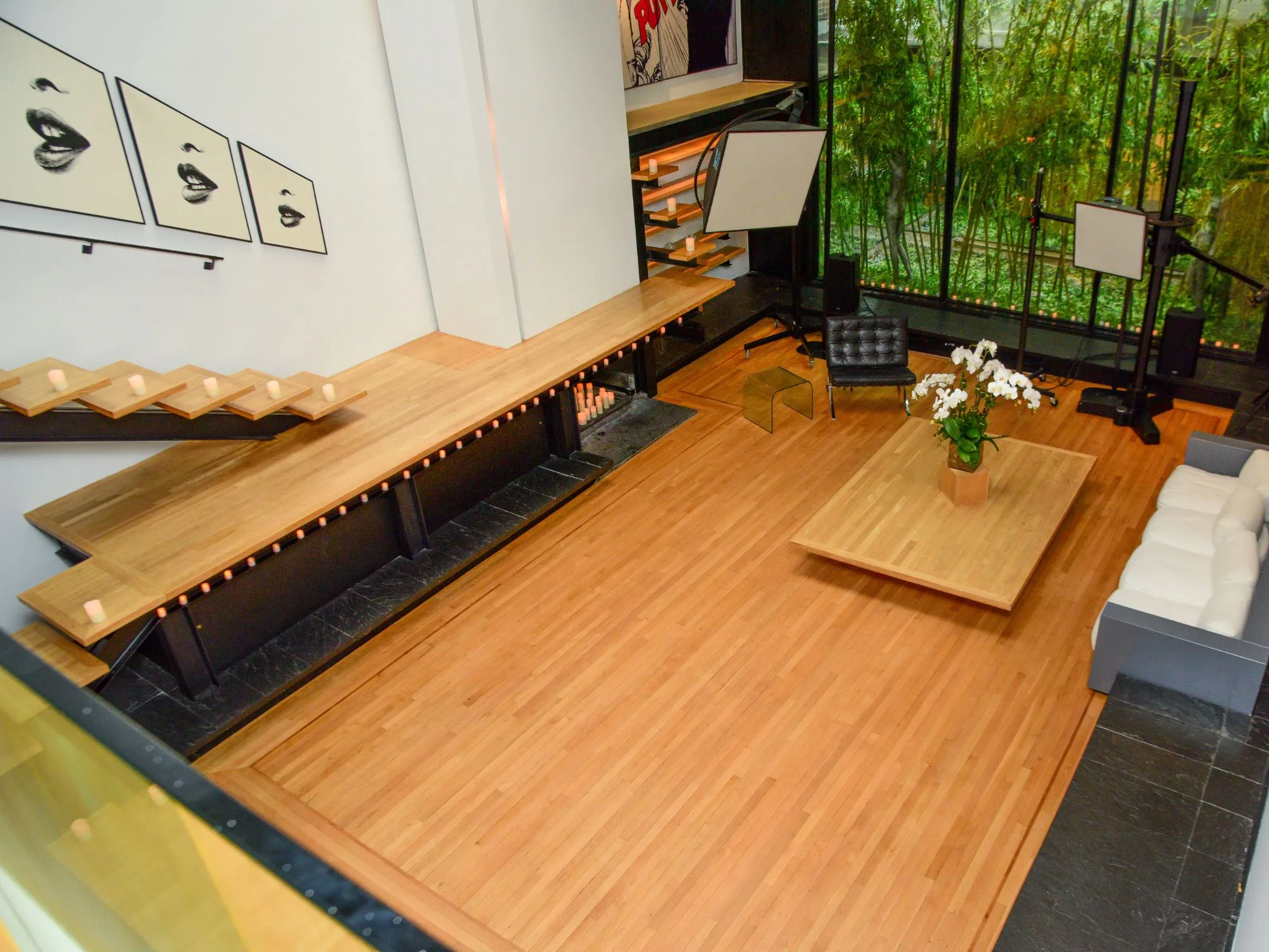Halston House living room and floating staircase in 2018, now laid with timber floorboards 