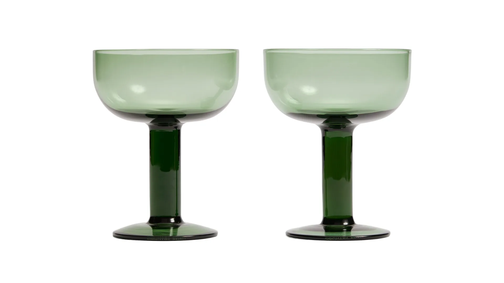 Two green glass coupes