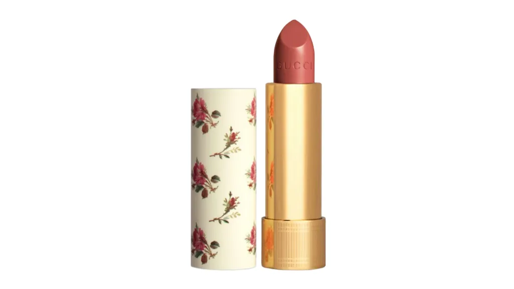 A nude lipstick from Gucci with floral design on the case.