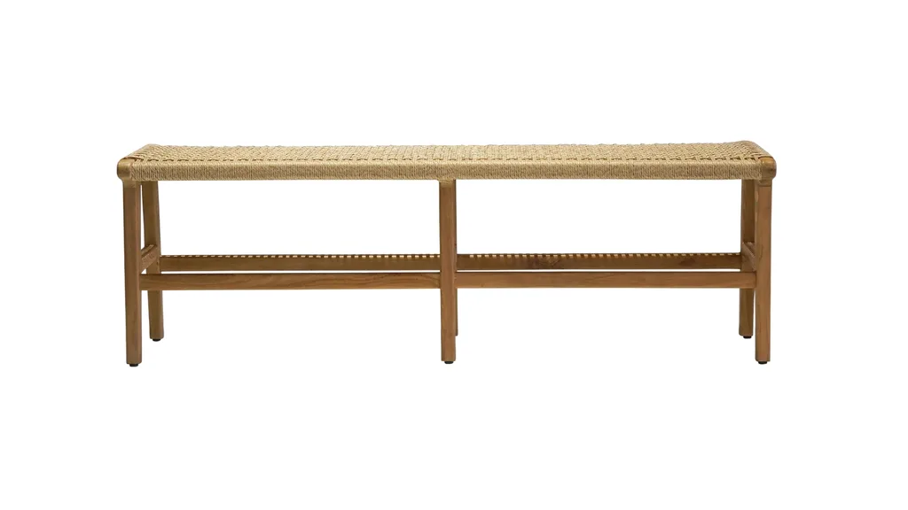 A rattan bench seat with timber legs.