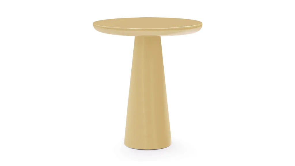 A yellow or beige side table.