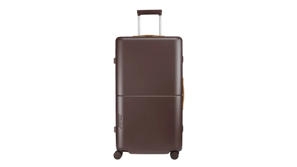 A deep brown coloured suitcase on wheels.