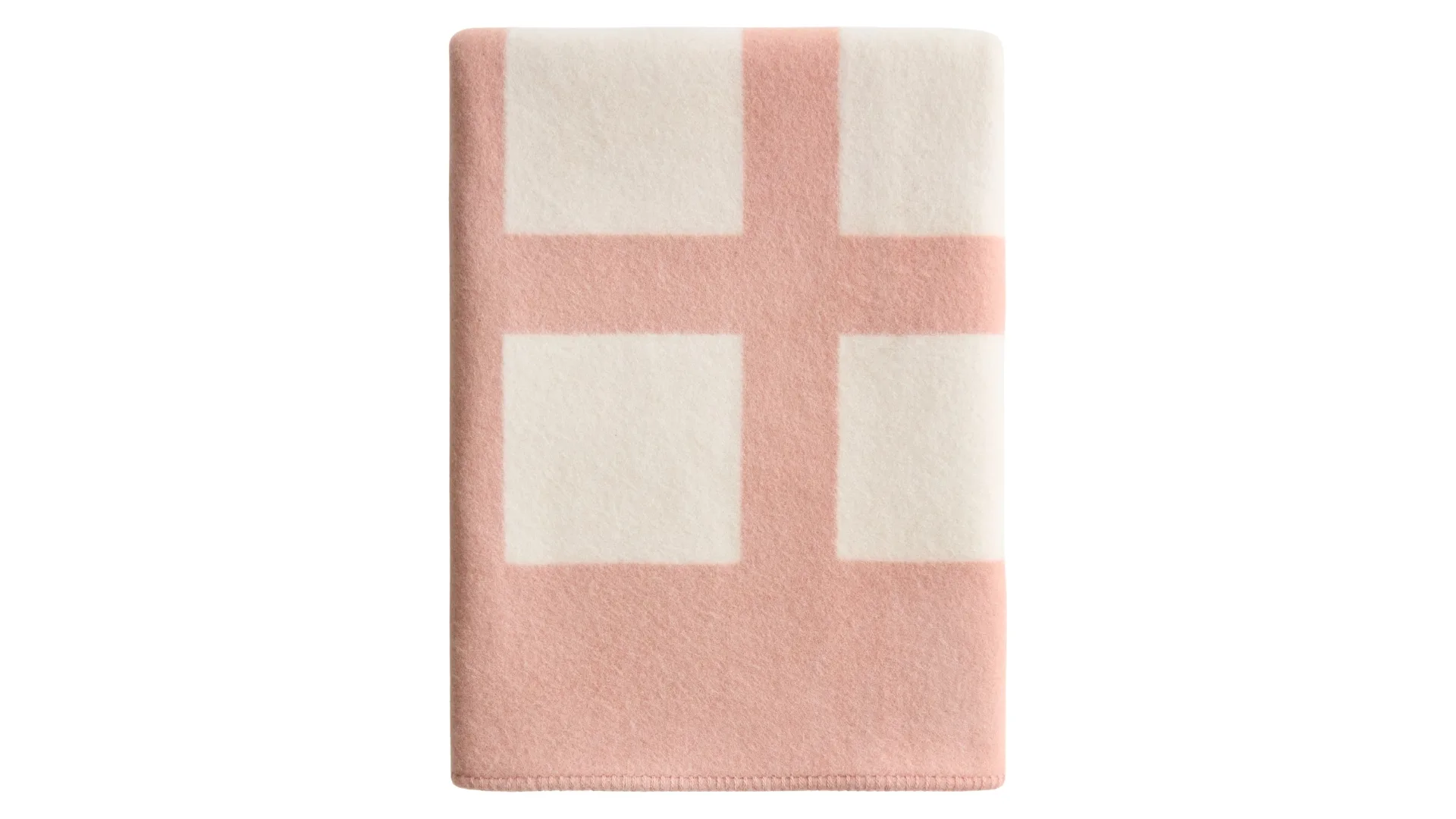 A pink and white throw blanket.