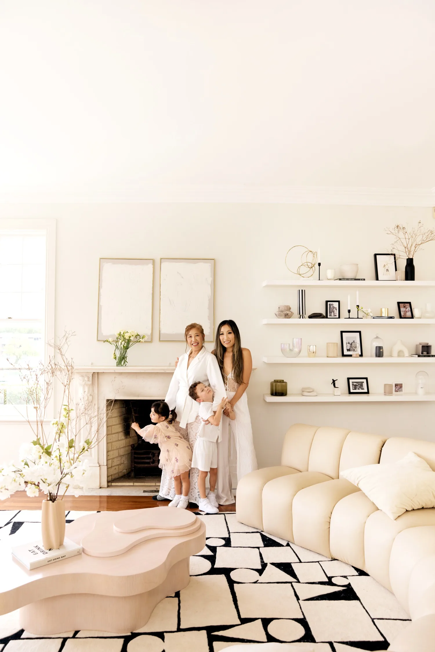 Jane with her mum and children in her living room
