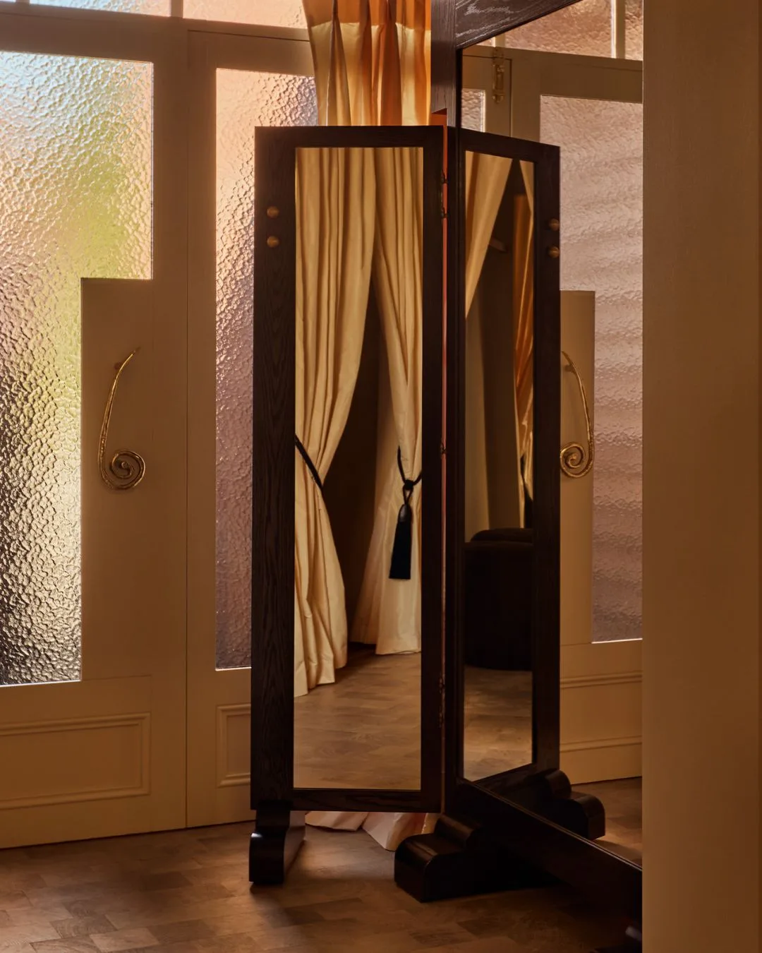 A tri fold antique mirror and glass doors at the Friends With Frank retail space in Armadale