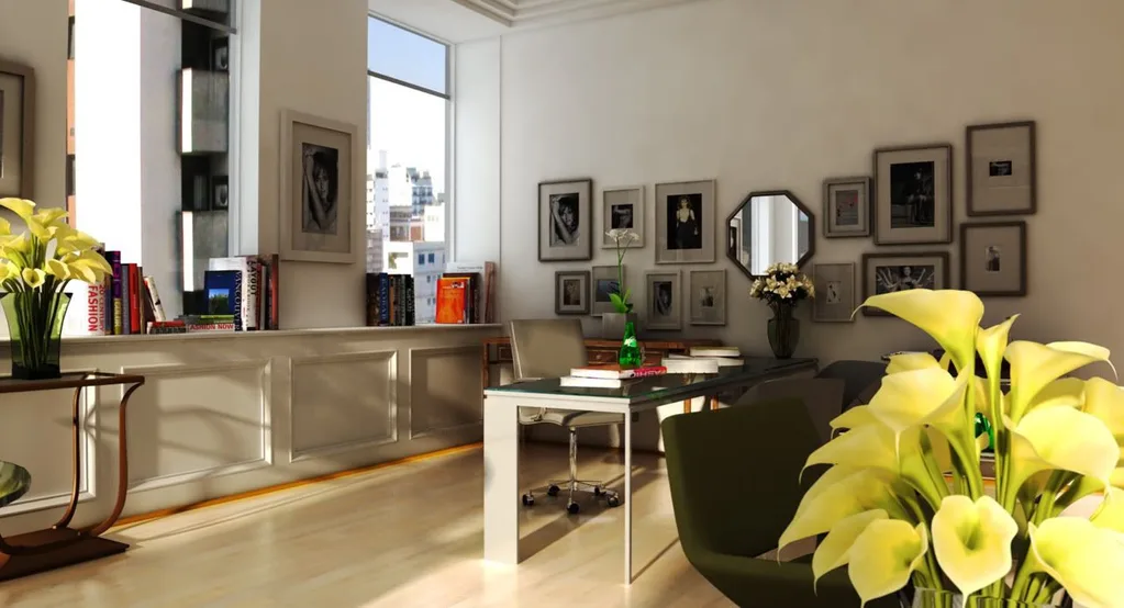Miranda Priestly's office set in The Devil Wears Prada. White walls are decorated with black and white photographs in an array of frames, with an octagonal shaped mirror in the middle. A glass and chrome desk is in the middle of the room. Vases of flowers decorate different surfaces.