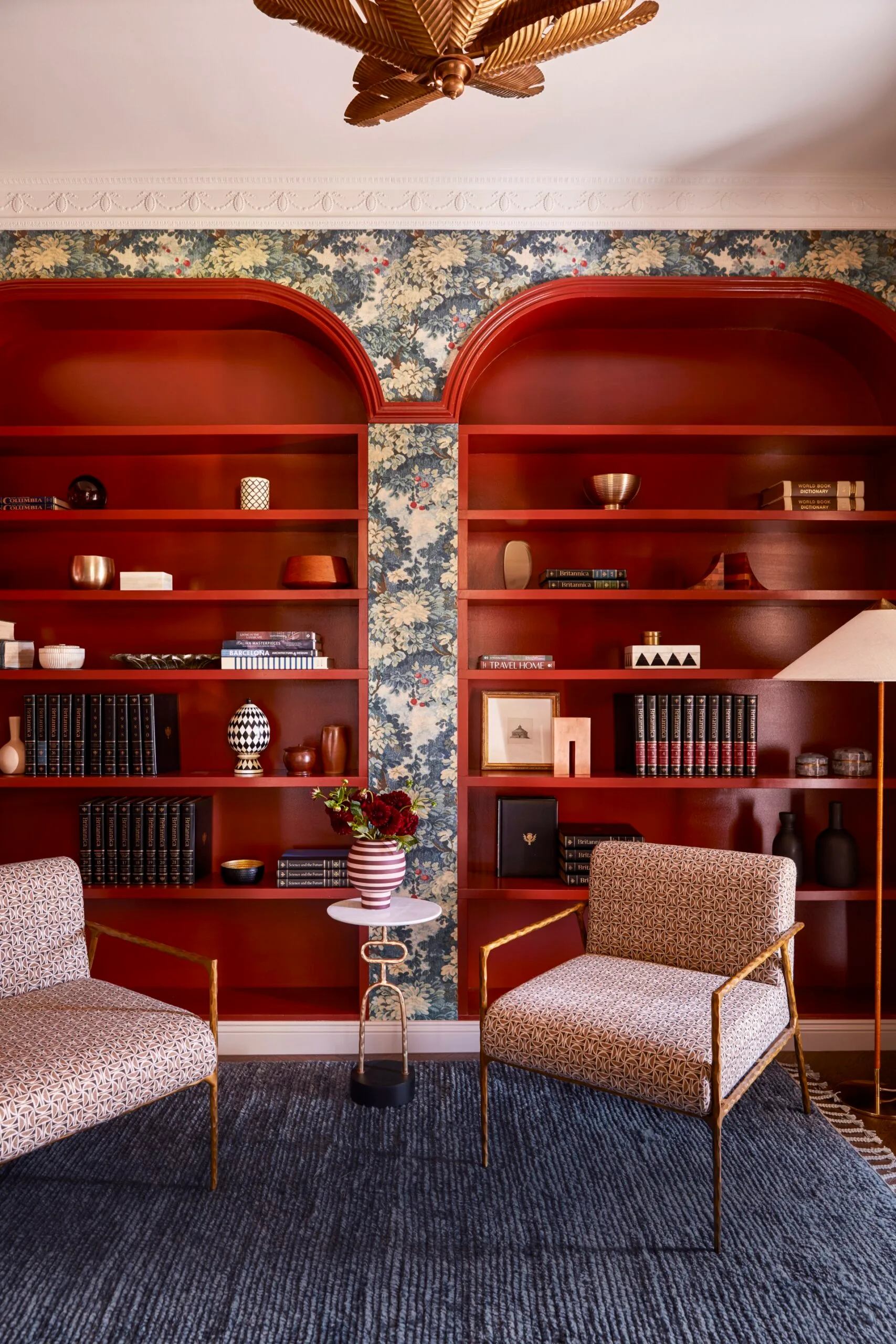 Balzan Coldstream library red arched bookshelves floral wallpaper