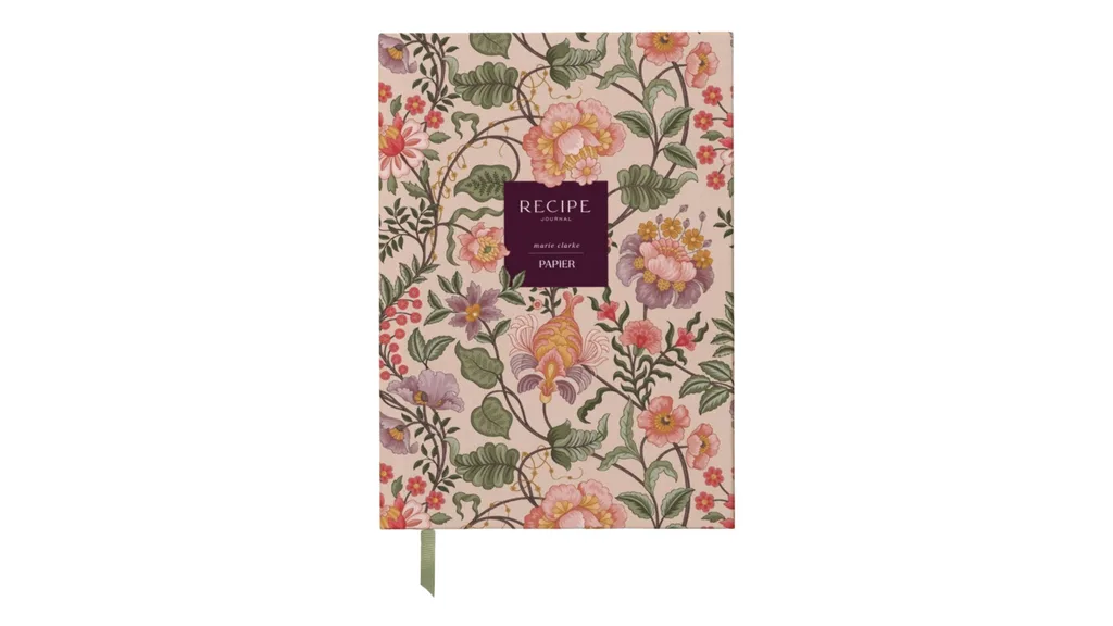 Recipe journal, hardcover with green ribbon bookmark and floral design on the cover.