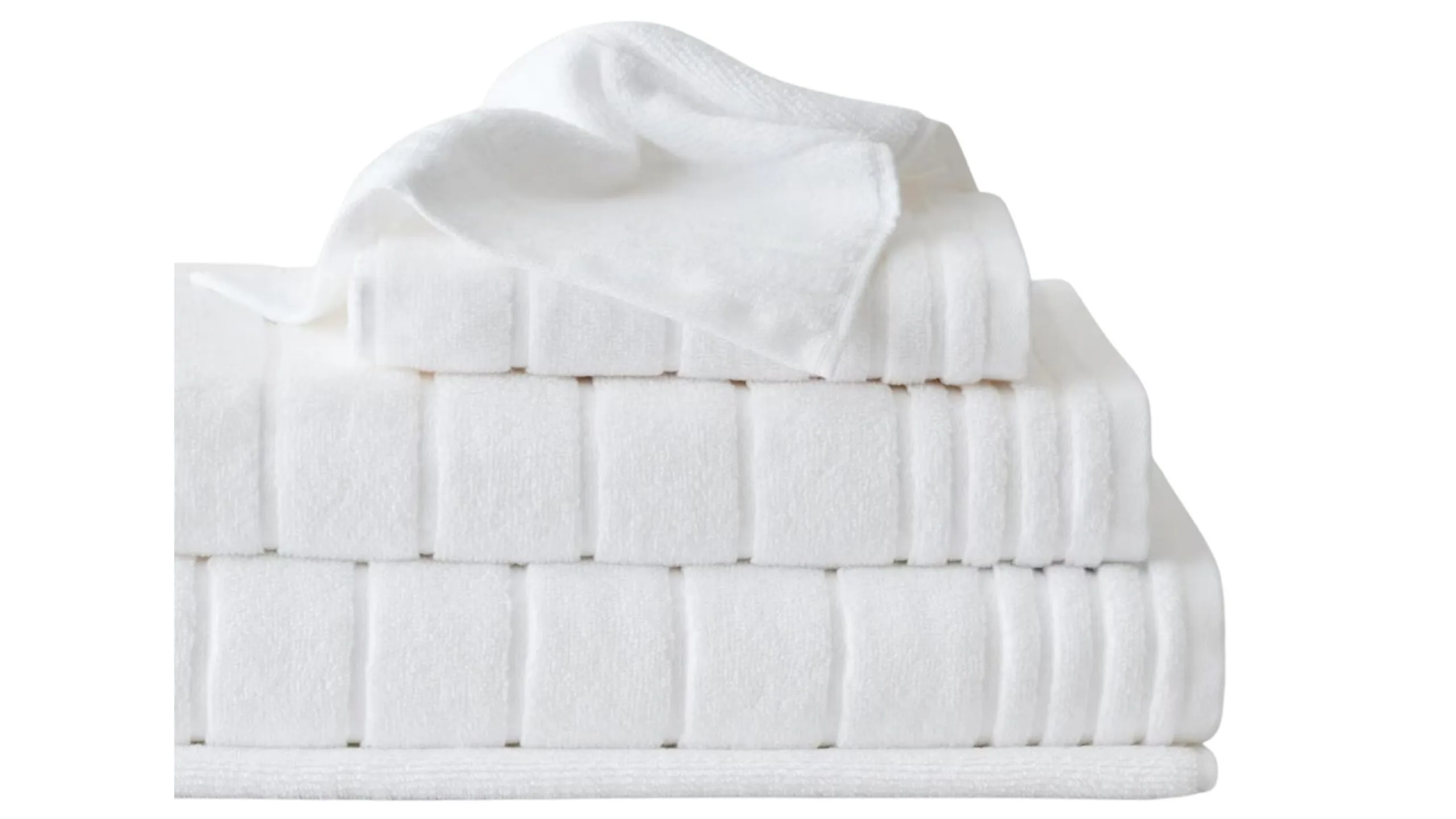 Set of white fluffy bath towels