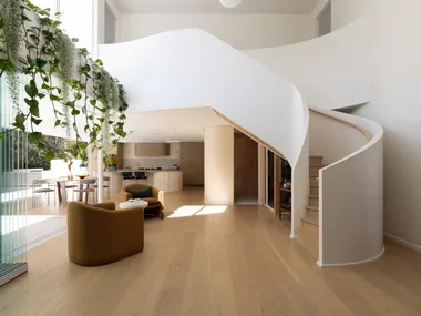 Sculptural, helix-inspired staircase by Kate Cooper Interiors and OGE Group Architects.