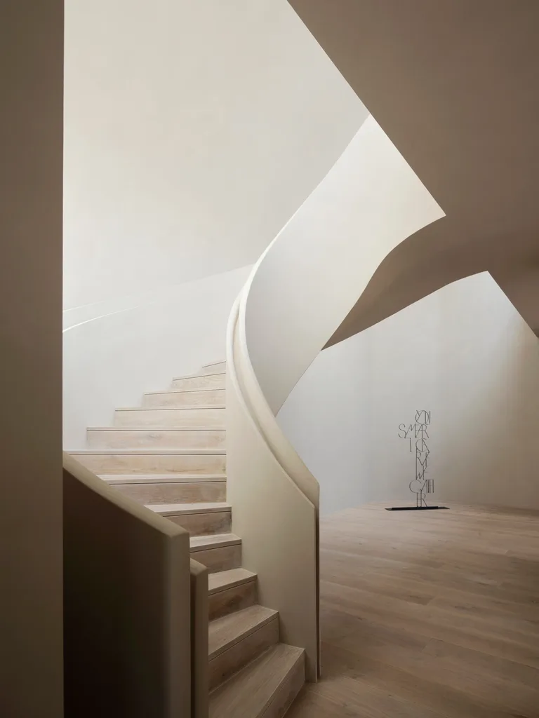 Staircase by Madeleine Blanchfield Architects, who utilised Rockcote Cerano render
