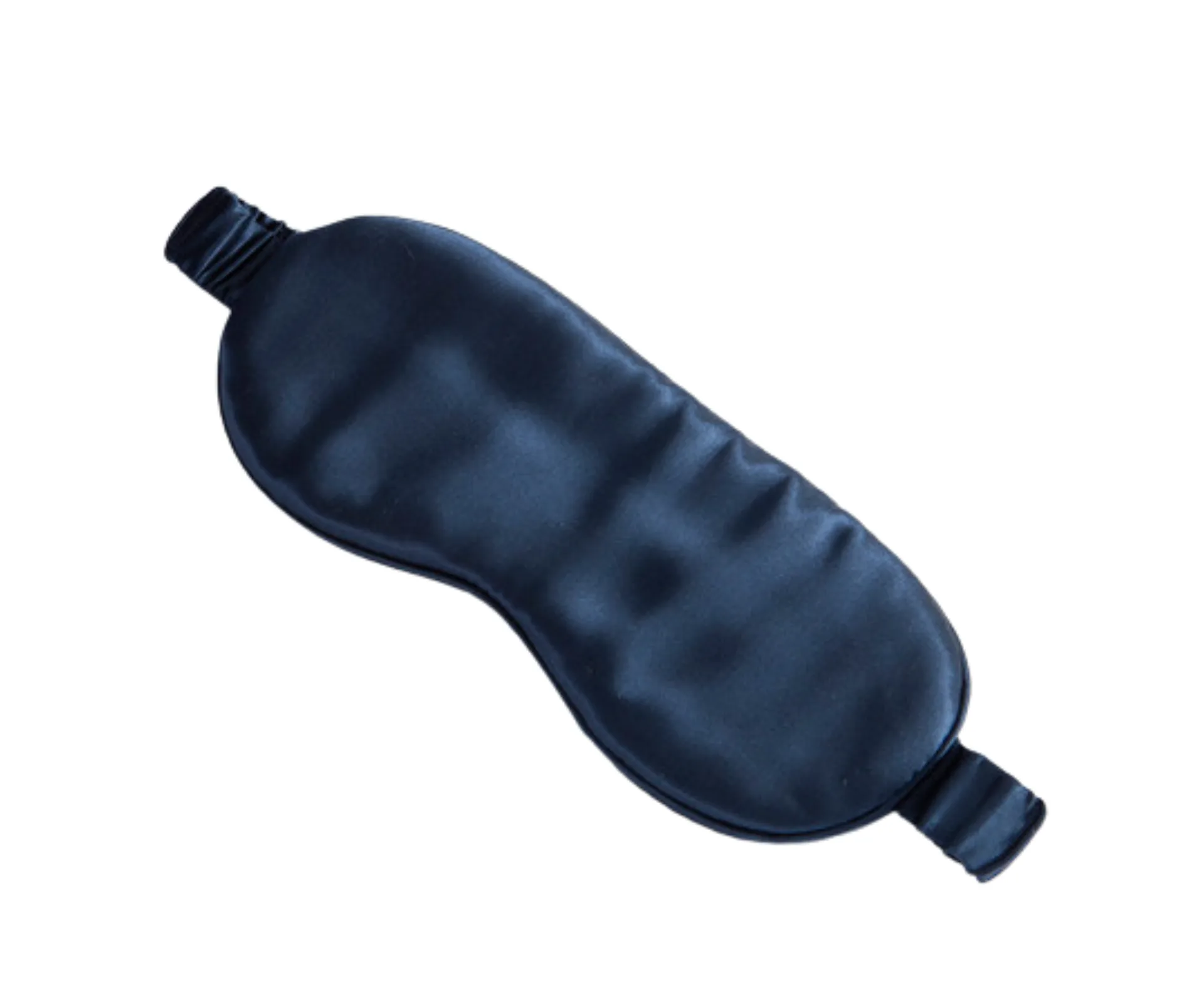 A deep, navy blue silk sleep mask set against a white background