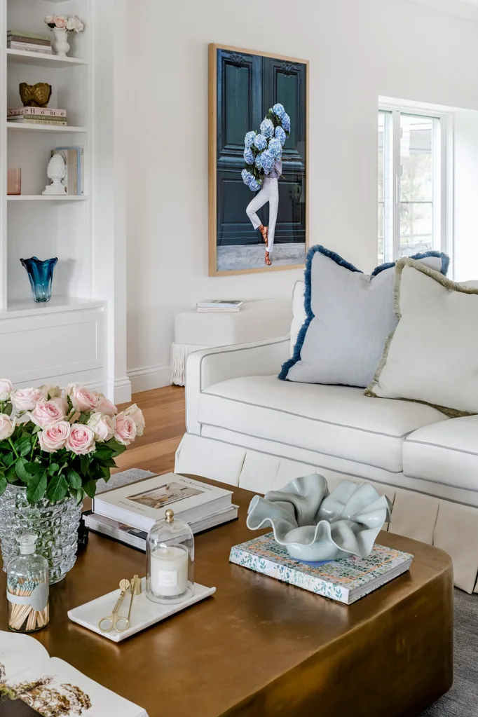 Clear Mountain home lounge area with art display and shelving