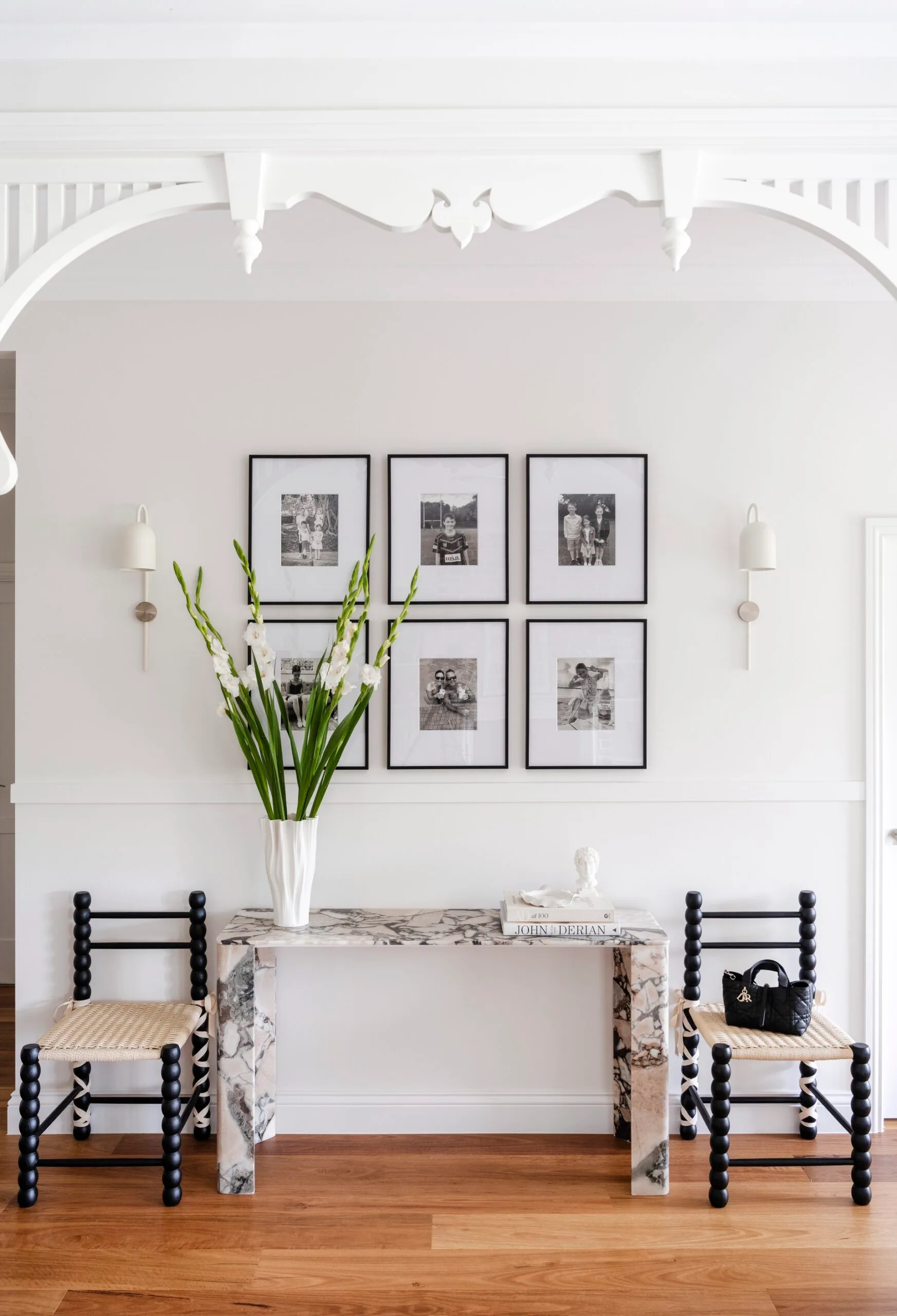Clear Mountain home entry way gallery wall marble hallway table