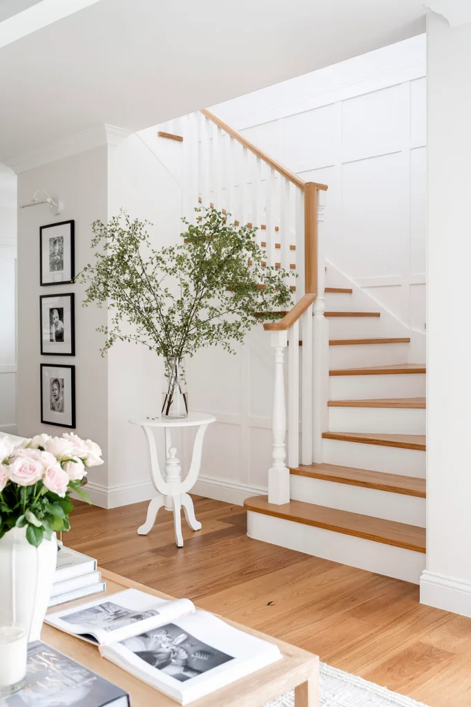 Clear Mountain home living room stairwell white and timber tones