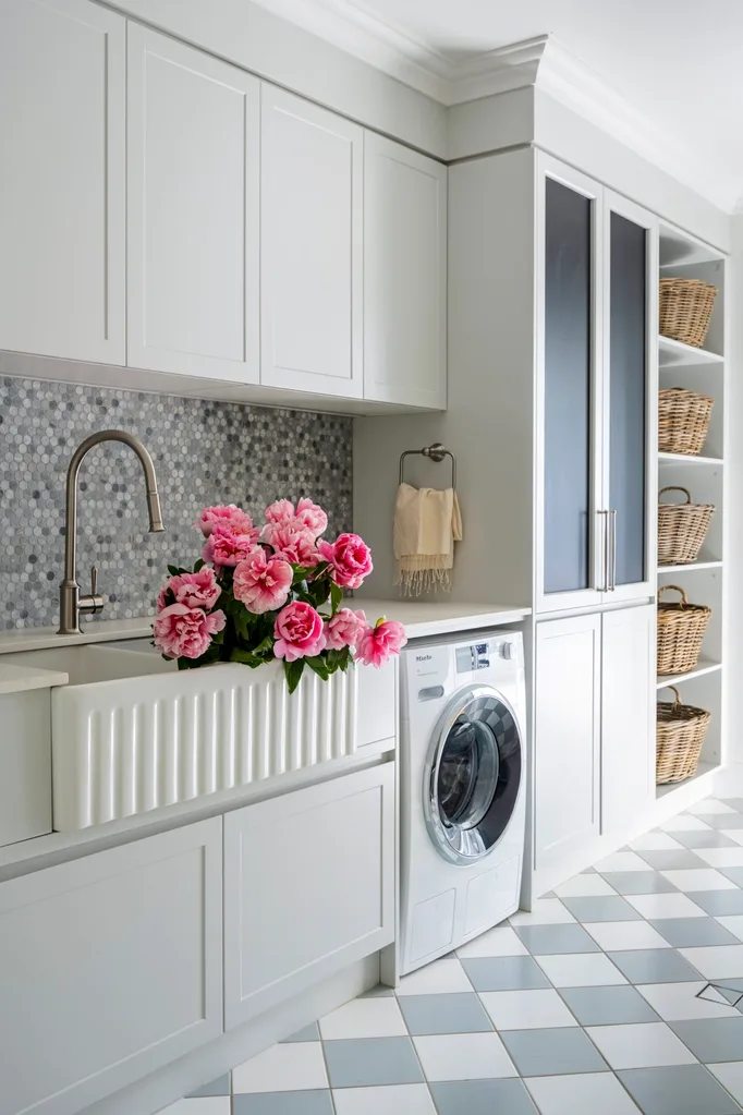 Clear Mountain laundry with blue and white cheque tiles pink flowers farmhouse sink