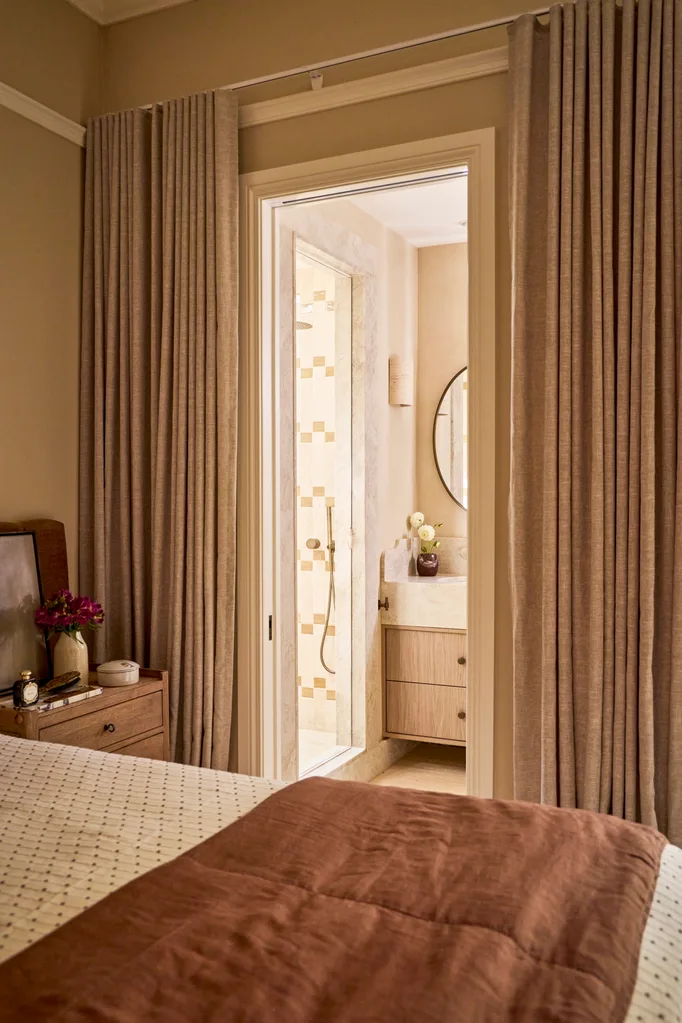 Steph and Gian's bedroom with a view through to ensuite