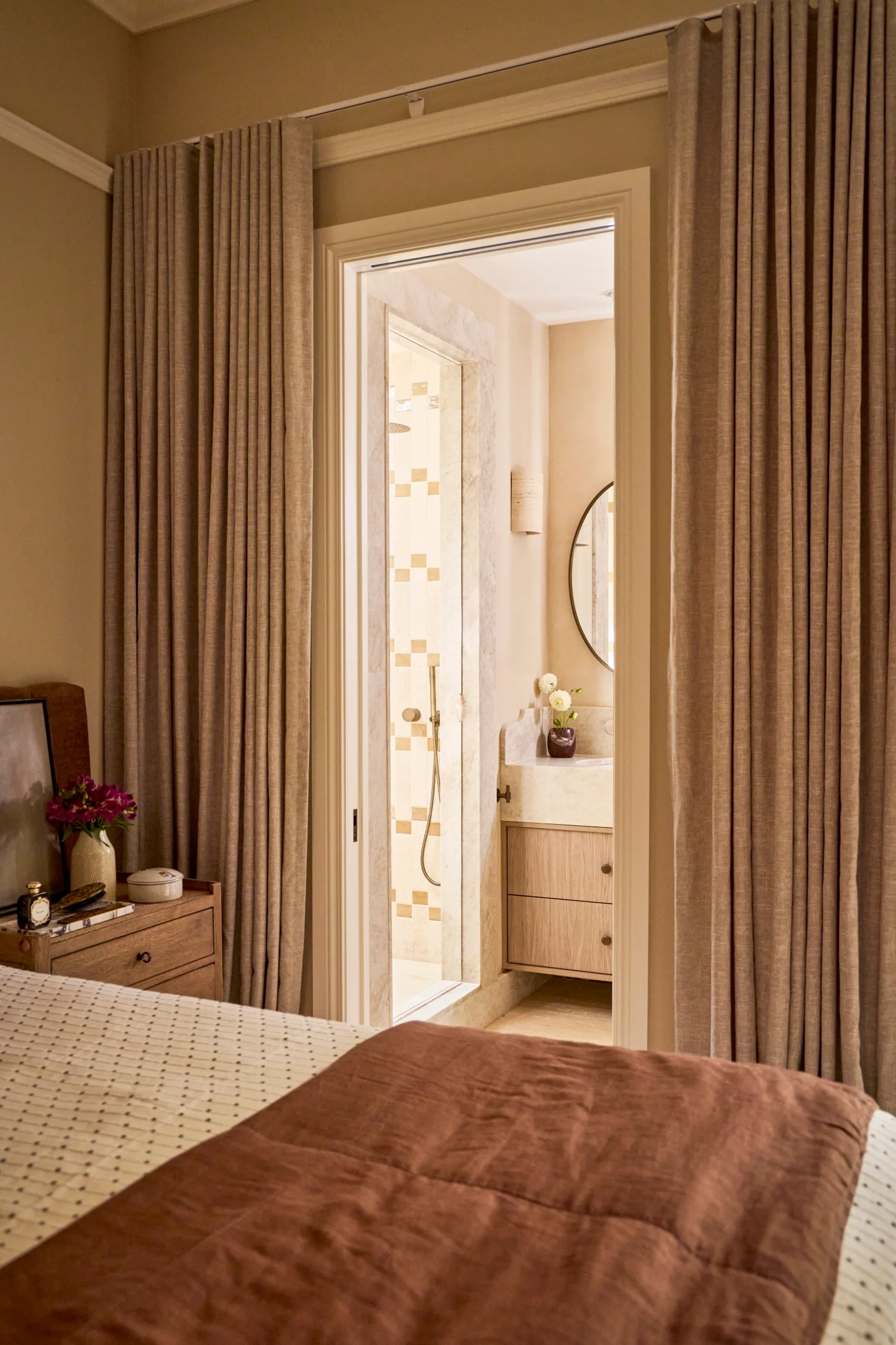 Steph and Gian's bedroom with a view through to ensuite