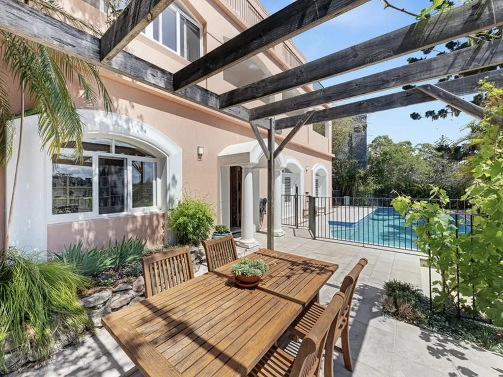 John Aiken's new "Tuscan-inspired" home.