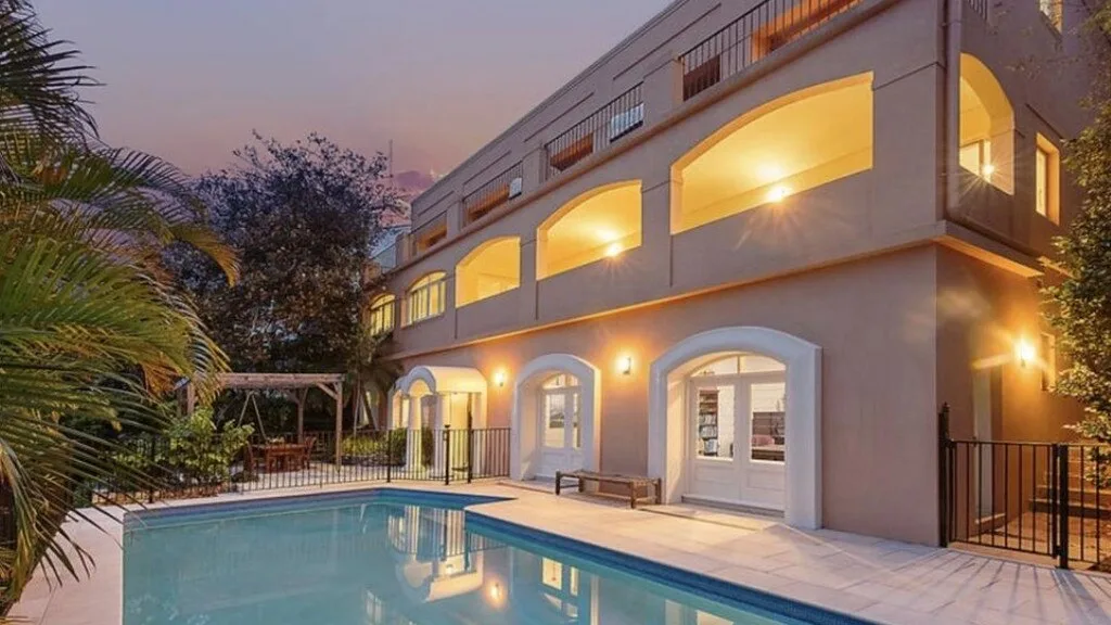 John Aiken's new "Tuscan-inspired" home.