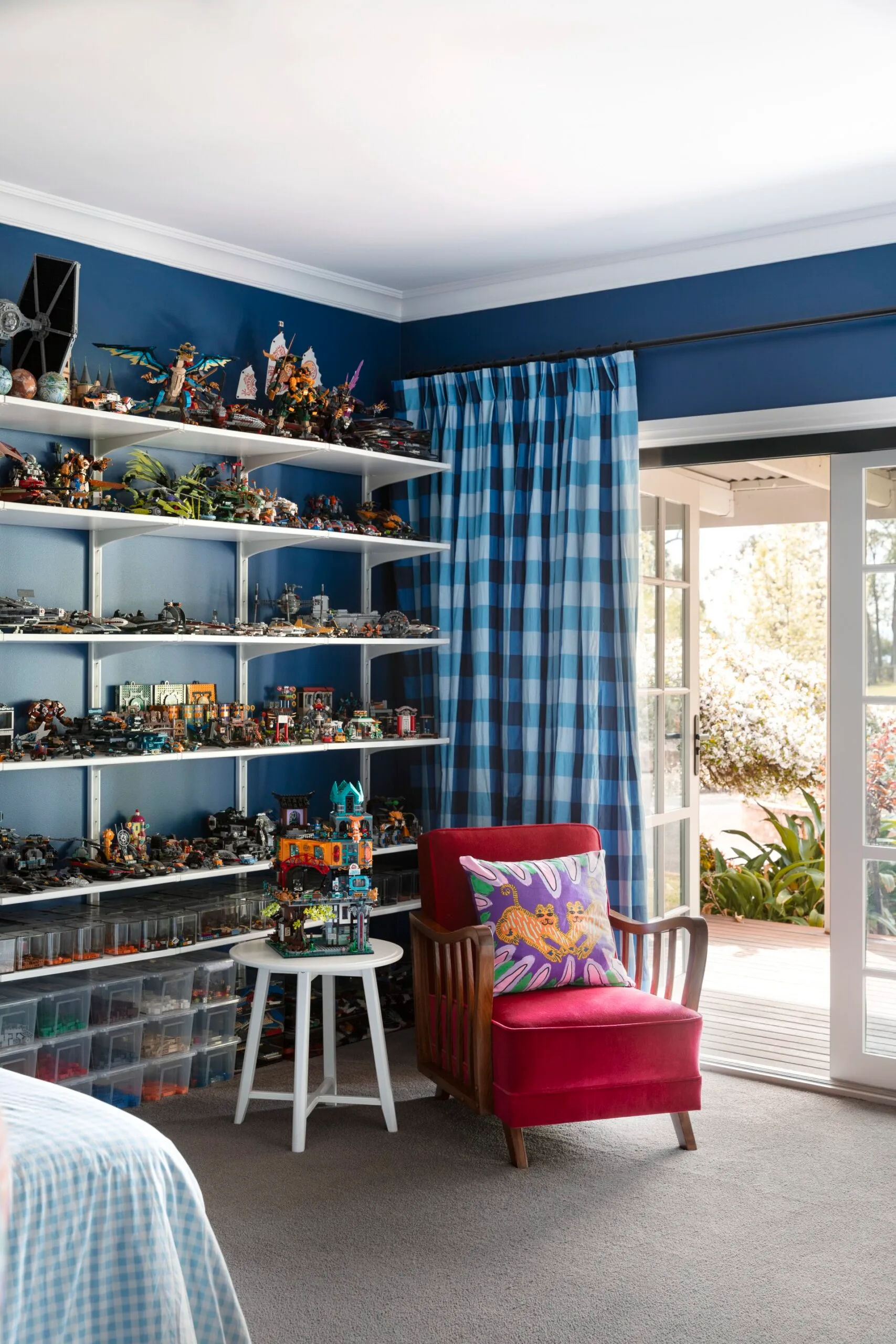 Yarra Valley home interior designer Carolyn Burns-McCrave blue room red occasional chair colourful