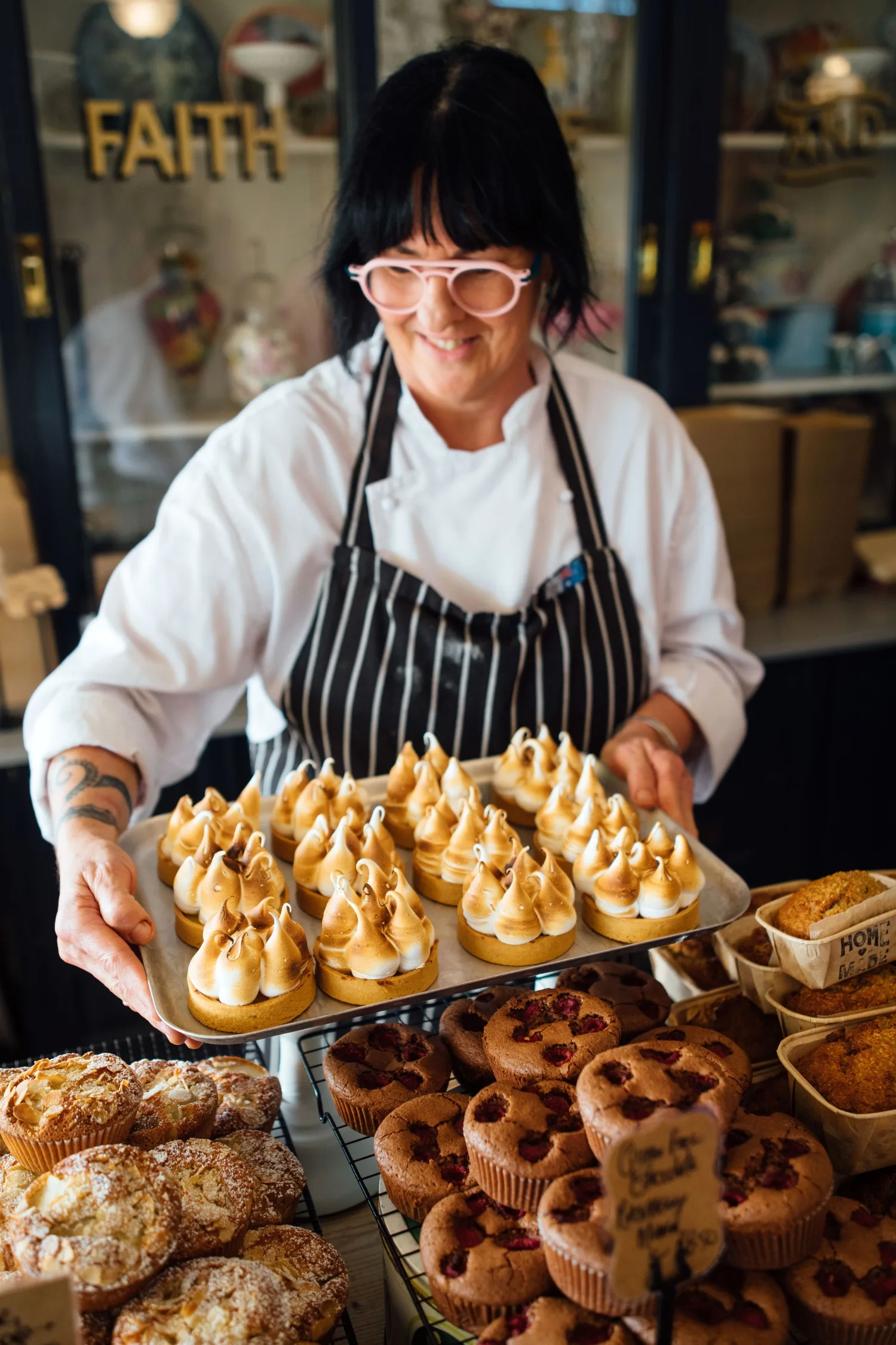 Cherie Bevan holding cakes