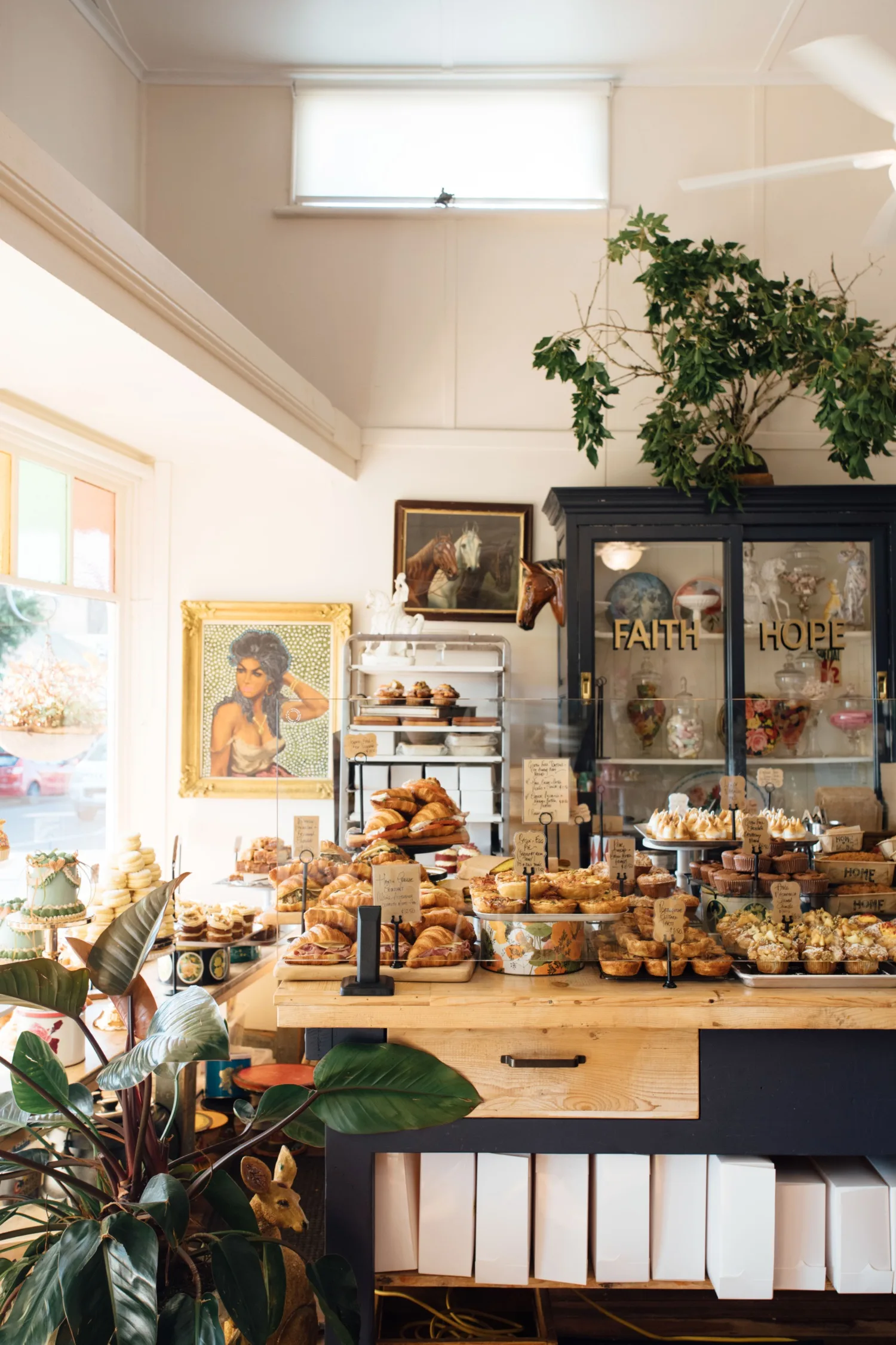 Counter of Home Alstonville covered in cakes and pastries