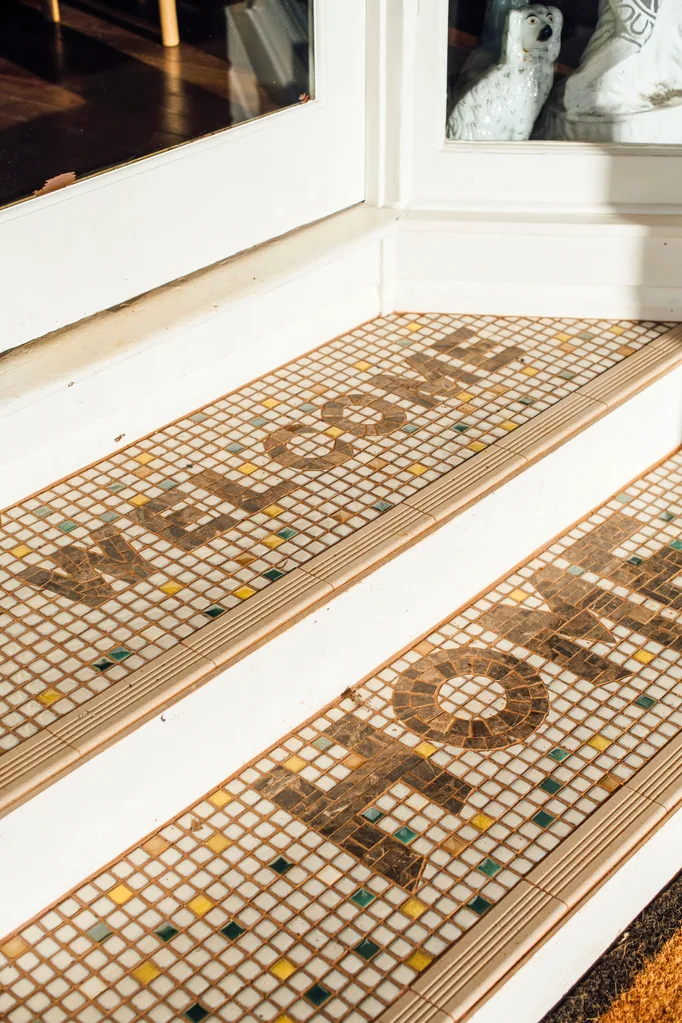 Front steps of Home Alstonville with Welcome Home in tiles