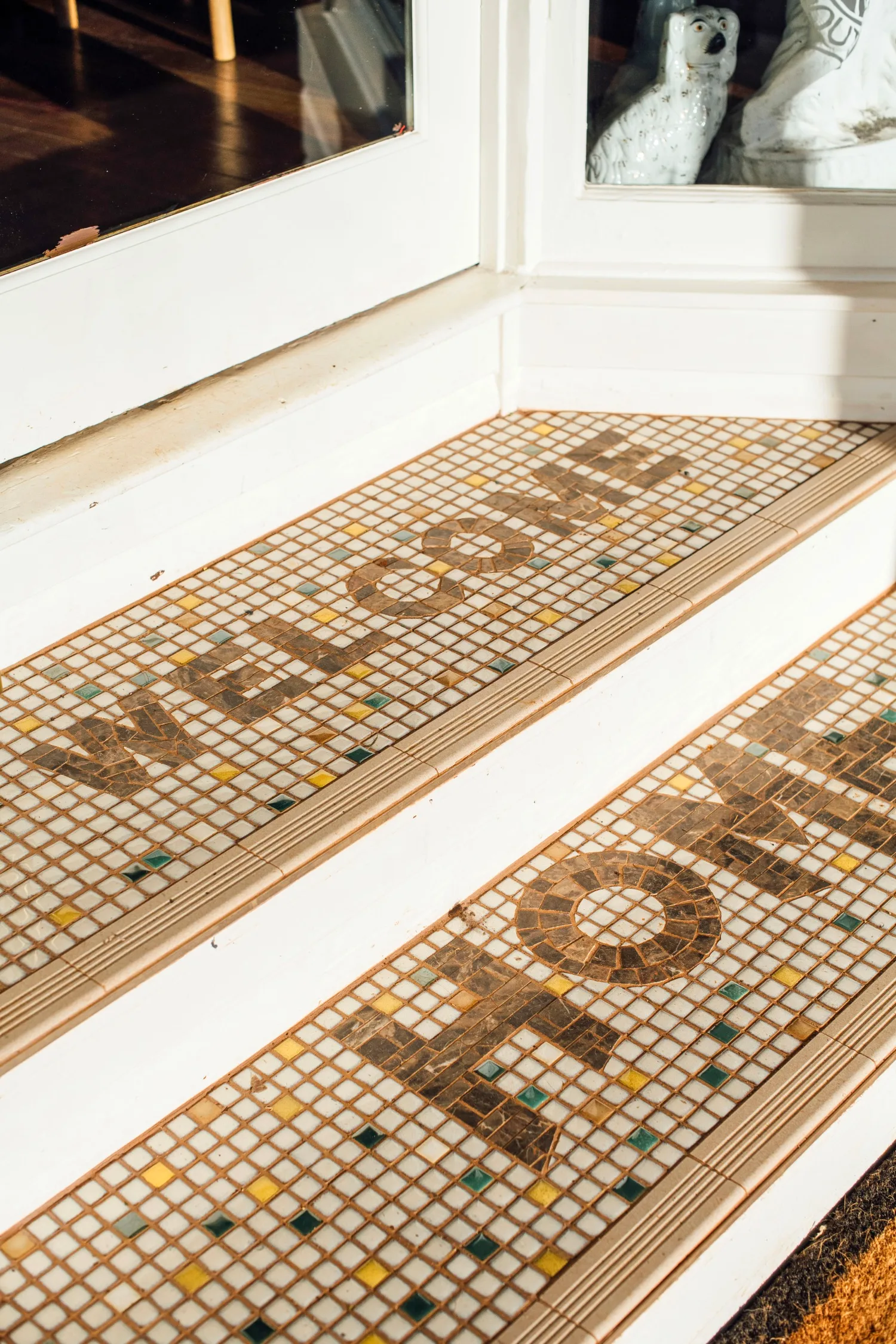 Front steps of Home Alstonville with Welcome Home in tiles