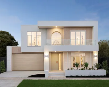 Modern two-story house with large windows, a light-colored facade, and a garage on the left side.