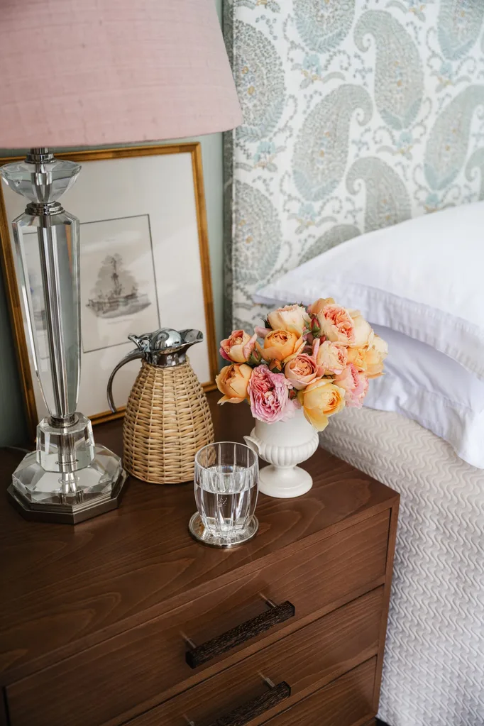 Brisbane penthouse by Oliver Mark Interiors by Hannah Puechmarin bedroom coffee table walnut flowers pink lamp