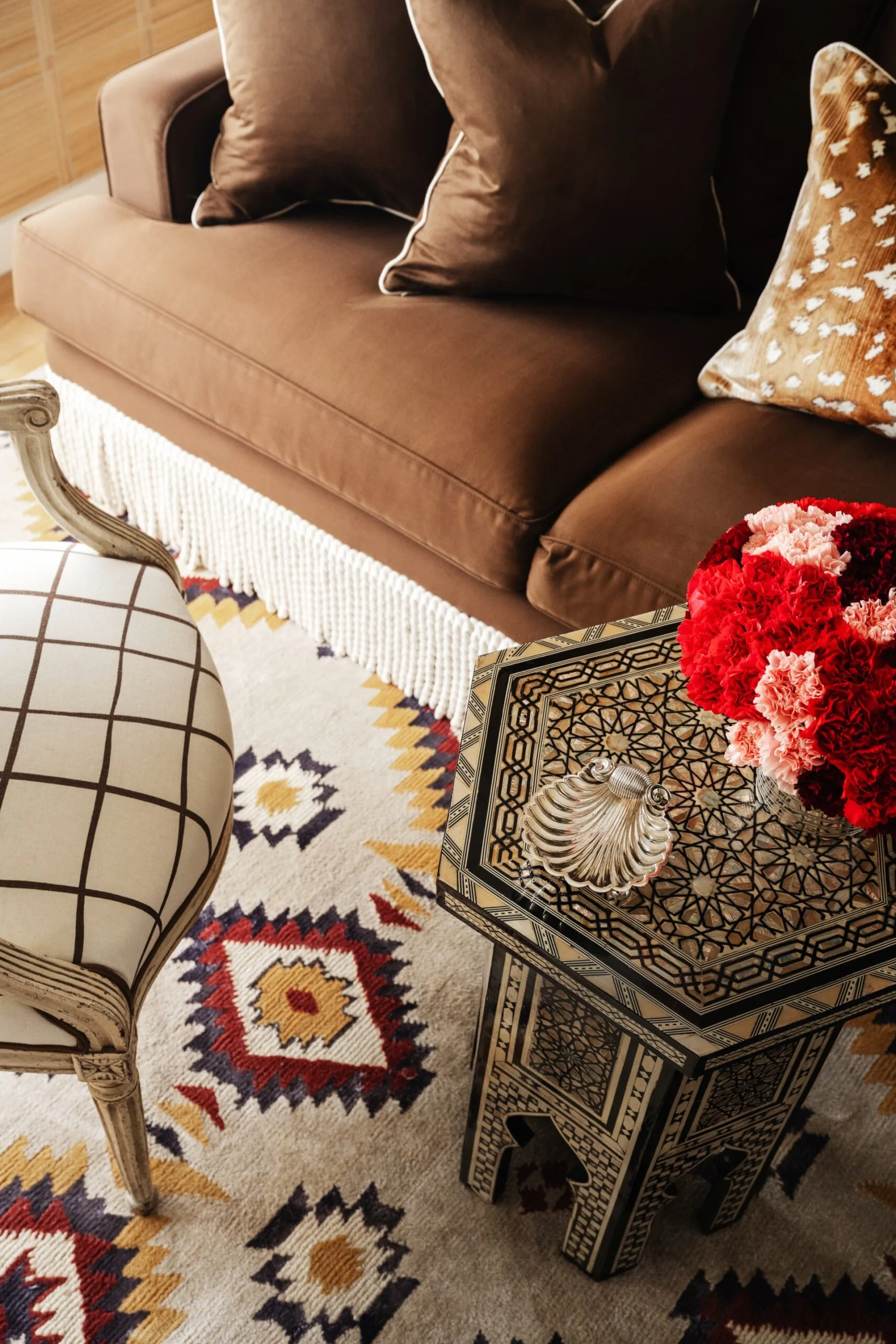 Brisbane penthouse by Oliver Mark Interiors by Hannah Puechmarin coffee table brown lounge rug