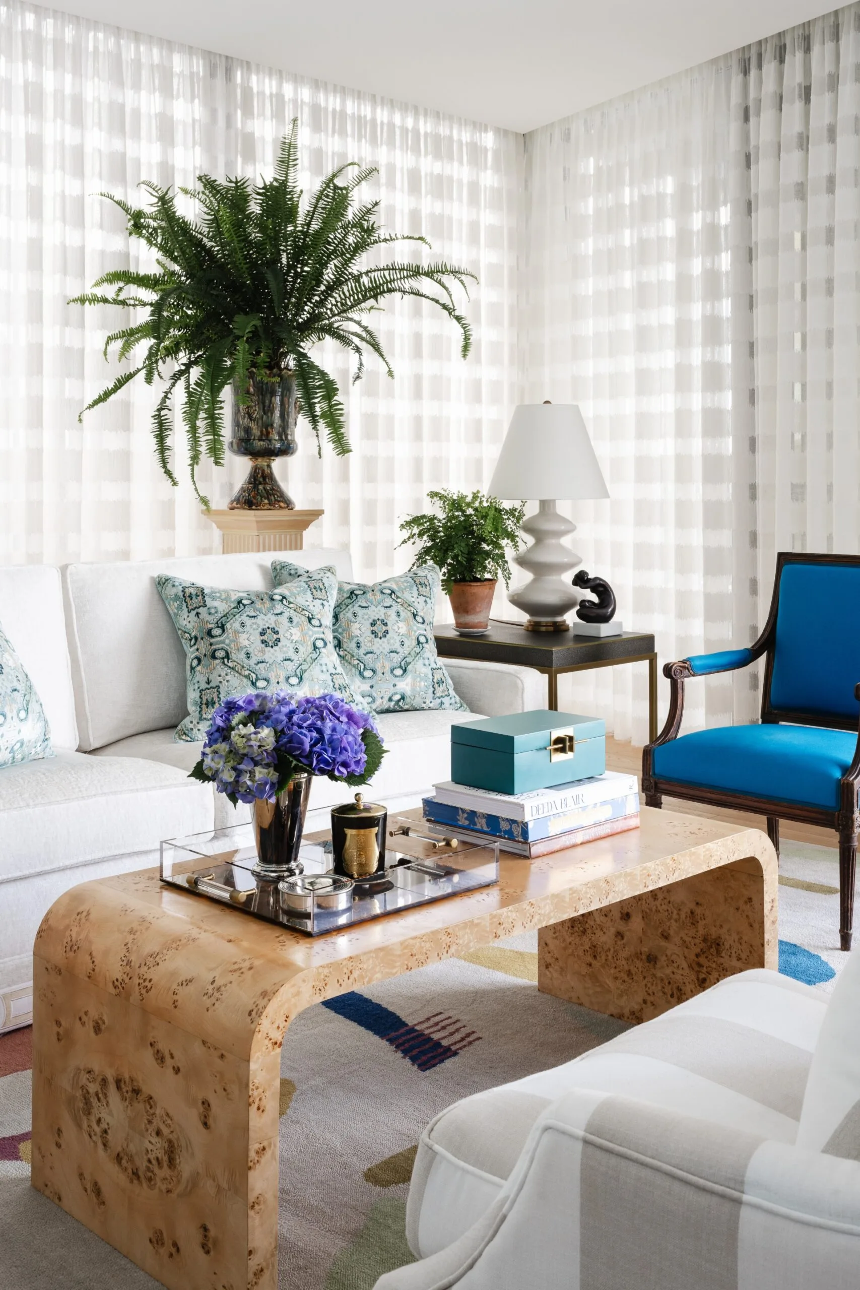 Brisbane penthouse by Oliver Mark Interiors by Hannah Puechmarin blue lounge room white
