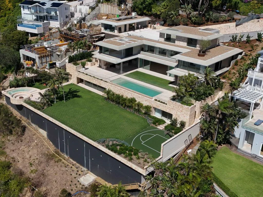 Jen Hawkins and Jake Wall’s Whale Beach home has been settled at $30m