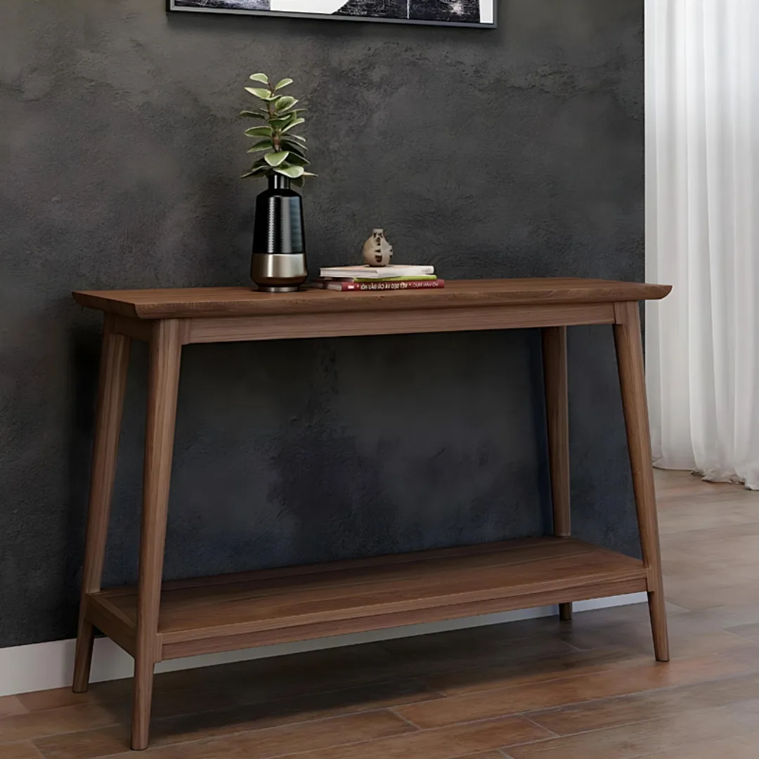 Dark timber console table with splayed legs and lower shelf for storage