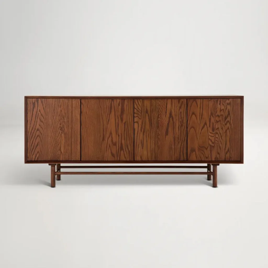 Low walnut timber side cabinets in mid century style for shoe storage at entry way