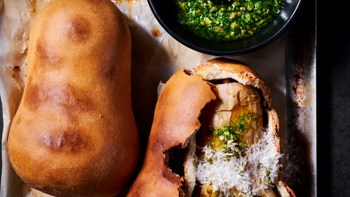 Whole salt roasted pumpkins with salsa verde