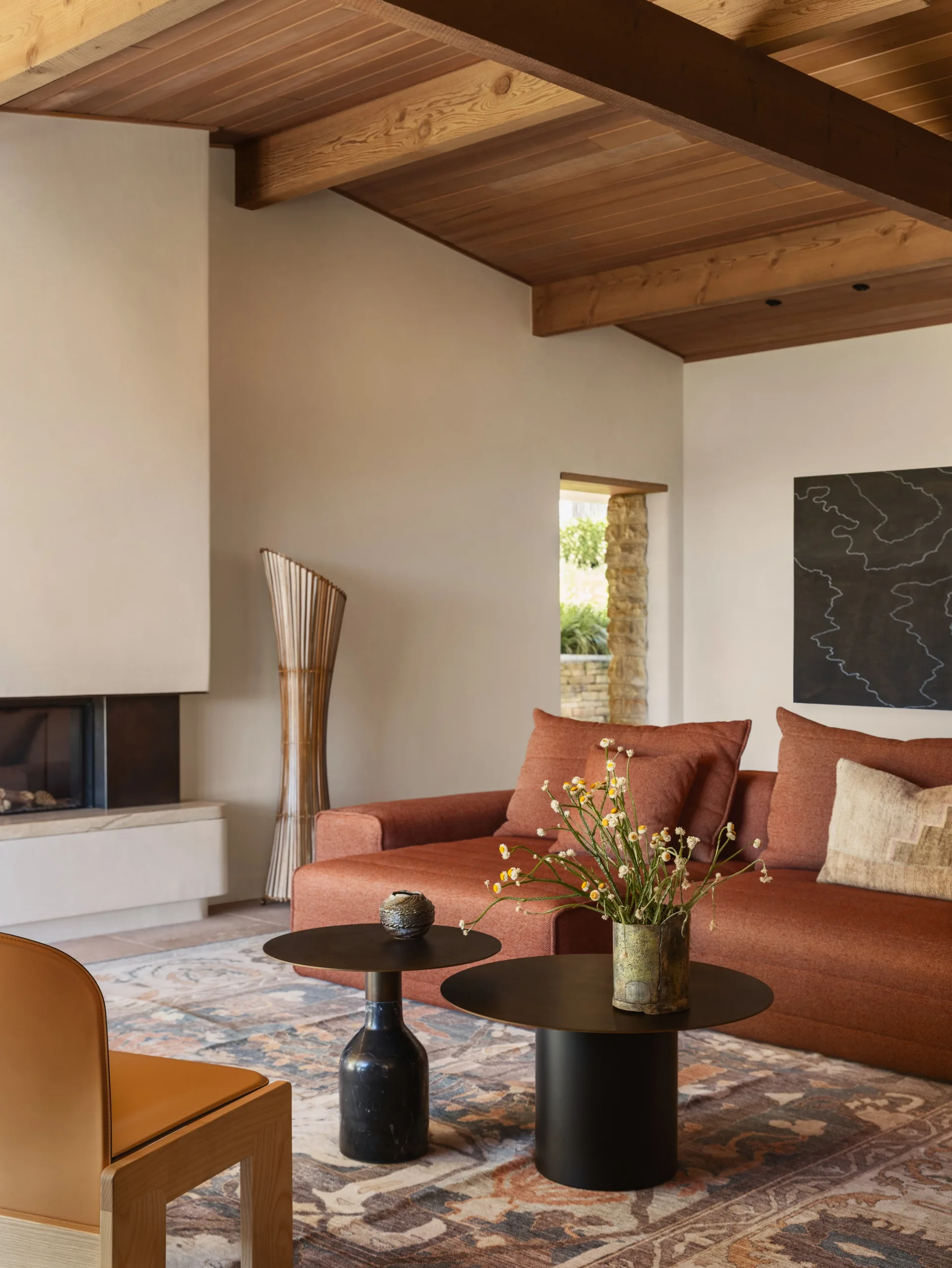 Cadence and Co cedar house living room wooden beams wooden ceiling microcement.